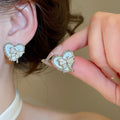 Korean Playful Alloy Heart Butterfly Pearl Stud Earrings For Women Elegant Silver Needle view 2