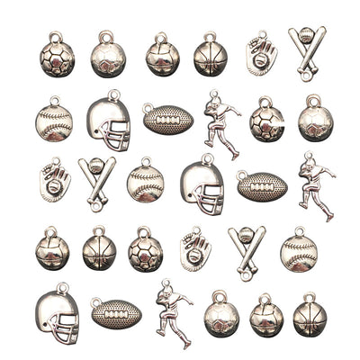 Metallic seashell charms arranged on a light background