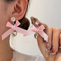 Elegant Pink Ribbon Bow Rhinestone Studs With Alloy Heart Charm Tassel Sweet Fashion Earrings view 1