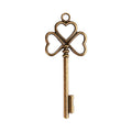Clover Bow Vintage Key Metal Charm in Three Finishes view 4