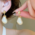 French Vintage Irregular Oval Faux Pearl Stud Earrings With Silver Posts Light Luxury Geometric Jewelry view 3
