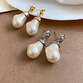 French Vintage Irregular Oval Faux Pearl Stud Earrings With Silver Posts Light Luxury Geometric Jewelry view 2