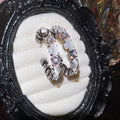 Light Luxury Round Cat Eye Stone Zircon Stud Earrings With Silver Needles For Women view 1