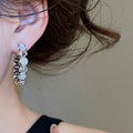 Light Luxury Round Cat Eye Stone Zircon Stud Earrings With Silver Needles For Women view 2