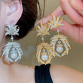 Vintage Copper Maple Leaf Stud Earrings With Silver Needle, Lucky Cat Accent, Light Luxury Dress Jewelry view 1