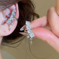 Sparkling Starburst Copper Rhinestone Clip-on Earrings For Women Luxury Geometric Ear Cuff view 3