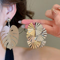Luxury Iron Hollow Leaf Fan Geometric Stud Earrings Exaggerated Statement Design view 1