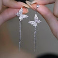 Korean Light Luxury Copper Zircon Butterfly Asymmetric Tassel Drop Earrings For Women view 1