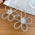 Elegant French Floral Hollow Faux Pearl Stud Earrings With Silver Needle Posts view 4