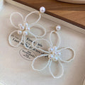Elegant French Floral Hollow Faux Pearl Stud Earrings With Silver Needle Posts view 2