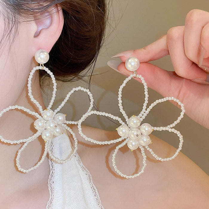 Elegant French Floral Hollow Faux Pearl Stud Earrings With Silver Needle Posts