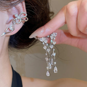 2026 Sparkling Zircon Heart Waterdrop Tassel Copper Clip-on Earrings With Playful Bow Accent