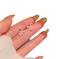 Sweet Floral Cat Eye Stone Pearl Stud Earrings With Silver Needle Niche Design view 5