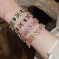 Light Luxury Copper Oval Flower Zircon Bangle With Sparkling Sweet Geometric Design view 1