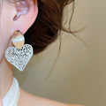 Alloy Heart Hollow Round Stud Earrings Light Luxury OL Style Minimalist Fashion Jewelry view 3