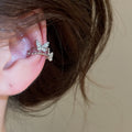 Light Luxury Copper Zircon Starburst Tassel Clip-on Earrings Geometric No Piercing Ear Cuffs view 3