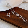 Light Luxury Copper Zircon Starburst Tassel Clip-on Earrings Geometric No Piercing Ear Cuffs view 2