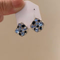 Light Luxury Alloy Stud Earrings With Sparkling Zircon Irregular Hollow Geometric Design view 2