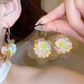 Vacation Style Hollow Floral Woven Faux Pearl Stud Earrings For Women view 1