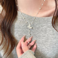 2026 Light Luxury Faux Pearl Beaded Crumpled Butterfly Pendant Collarbone Necklace view 4