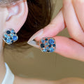 Light Luxury Alloy Stud Earrings With Sparkling Zircon Irregular Geometric Hollow Design view 1