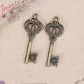 Crown Bow Skeleton Key Alloy Charm in 3 Metal Finishes view 3
