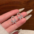 Sparkling Rhinestone Butterfly Bow Faux Pearl Stud Earrings Exotic Sweet Light Luxury Jewelry view 1