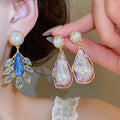 2026 Vintage Court Style Faux Pearl Teardrop Feather Stud Earrings With Silver Pins view 1