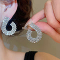 Light Luxury Copper Water Drop Stud Earrings With Sparkling Rhinestone Geometric Design view 1
