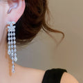 Light Luxury Copper Double C Tassel Drop Earrings With Silver Posts For Evening Wear view 3