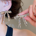 Elegant Alloy Ribbon Bow Stud Earrings For Women, Minimalist Fashion Face-Slimming Ear Jewelry view 3