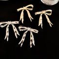 Elegant Alloy Ribbon Bow Stud Earrings For Women, Minimalist Fashion Face-Slimming Ear Jewelry view 2