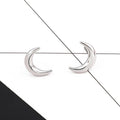 Gold Tone Crescent Moon Stud Earrings with Textured Surface Detail view 4