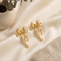Light Luxury Gold Alloy Bowknot Stud Earrings, Elegant Niche Design Textured Ribbon Drop Fashion Earrings view 2