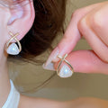 Light Luxury Cat Eye Stone Pearl Flower Geometric Stud Earrings With Silver Needle view 4