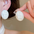 Enamel Wrinkled Oval Alloy Stud Earrings For Women Modern Minimalist Geometric Light Luxury view 3