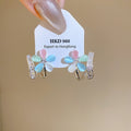 Light Luxury Copper Adjustable Bangle With Resin Zircon Butterfly And Flower Design view 4