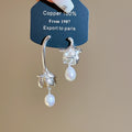 French Vintage Asymmetric Oval Freshwater Pearl Stud Earrings With Sterling Silver Posts view 3