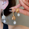 French Vintage Asymmetric Oval Freshwater Pearl Stud Earrings With Sterling Silver Posts view 2