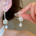 French Vintage Asymmetric Oval Freshwater Pearl Stud Earrings With Sterling Silver Posts view 4