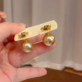 Copper Silver Needle Zircon Clover Flower Pearl Stud Earrings Light Luxury Versatile Jewelry view 2
