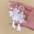 Elegant Floral Shell Faux Pearl Stud Earrings For Women Light Luxury Banquet Jewelry view 1