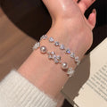 Modern Minimalist Faux Pearl Beaded Bracelet With Bowknot Heart Zircon Charm For Women view 3