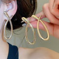 Minimalist Alloy Teardrop Stud Earrings With Silver Pins, Smooth Cross Hollow Light Luxury Style view 1