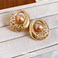 Alloy Round Hollow Pearl Stud Earrings For Women Light Luxury Geometric Jewelry view 4