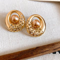 Alloy Round Hollow Pearl Stud Earrings For Women Light Luxury Geometric Jewelry view 2