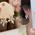 2026 New Spring Summer Copper Flower Earrings Cute Floral Ear Cuff Design For Women view 1