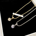 Light Luxury Copper Zircon Round Starburst Pendant Necklace For Women Elegant Collarbone Chain view 3