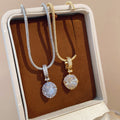 Light Luxury Copper Zircon Round Starburst Pendant Necklace For Women Elegant Collarbone Chain view 1
