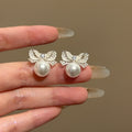 Silver Needle Zircon Bow Faux Pearl Stud Earrings French Elegant Light Luxury Office Jewelry view 3